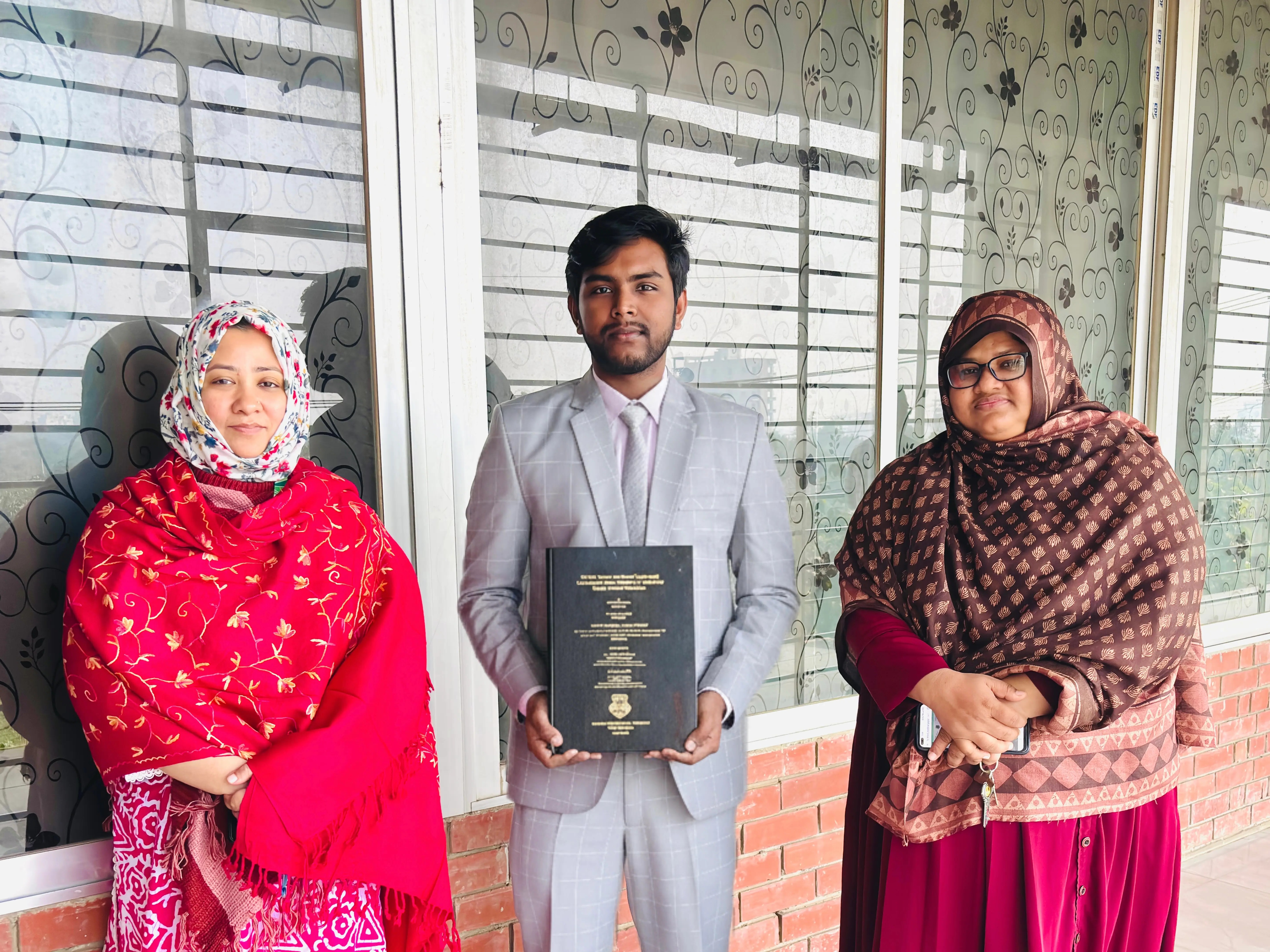 Nazmul Huda Badhon with faculty members